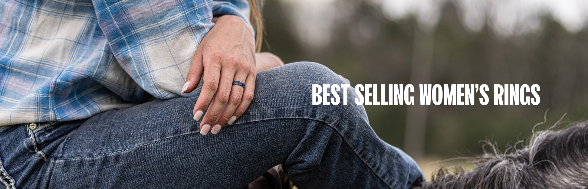 Best Selling Women's Rings, women holding the hatch of her car up with mountains in the background