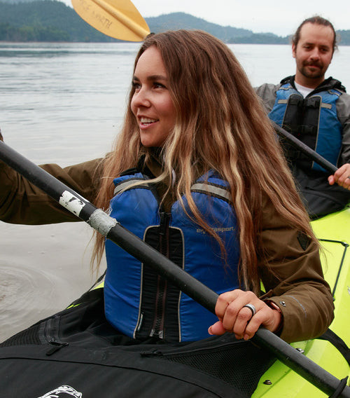 woman kayaking wearing a Groove Life ring
