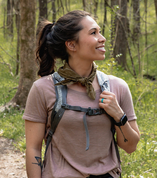 woman hiking wearing a Groove Life ring