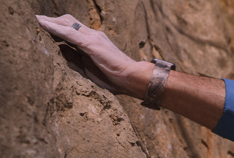 Wear a silicone Groove Ring while rock climbing