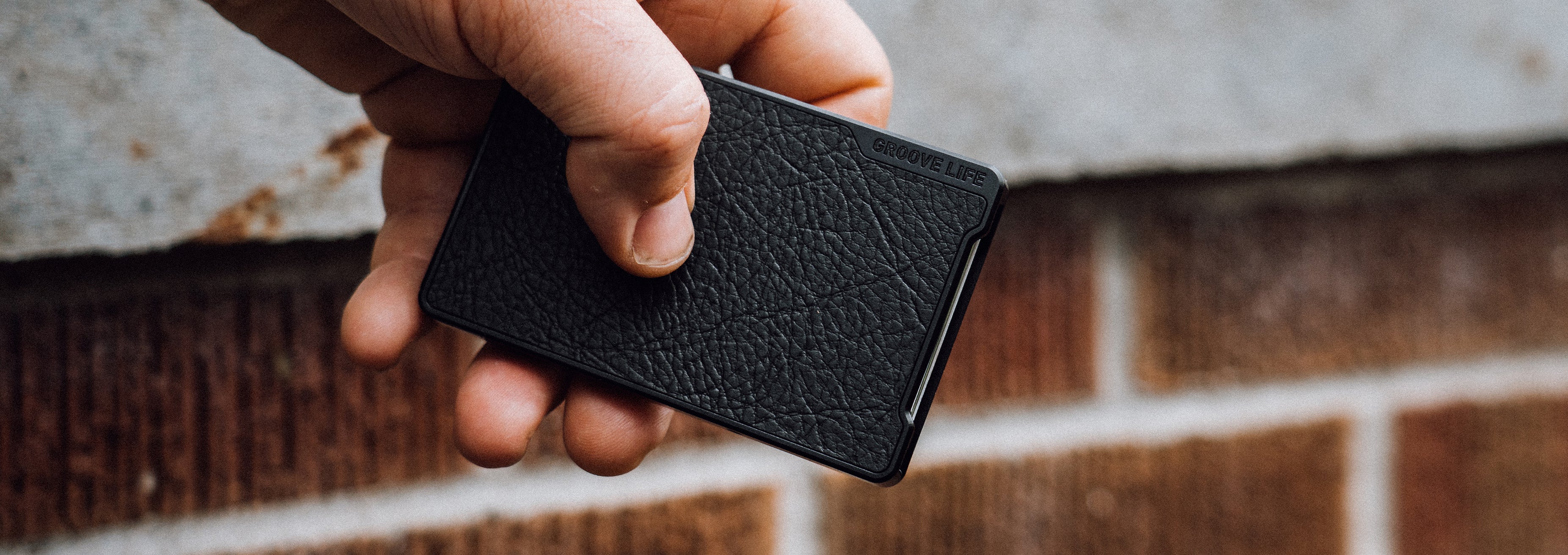 Groove Wallet® Leather - Black lifestyle image 2